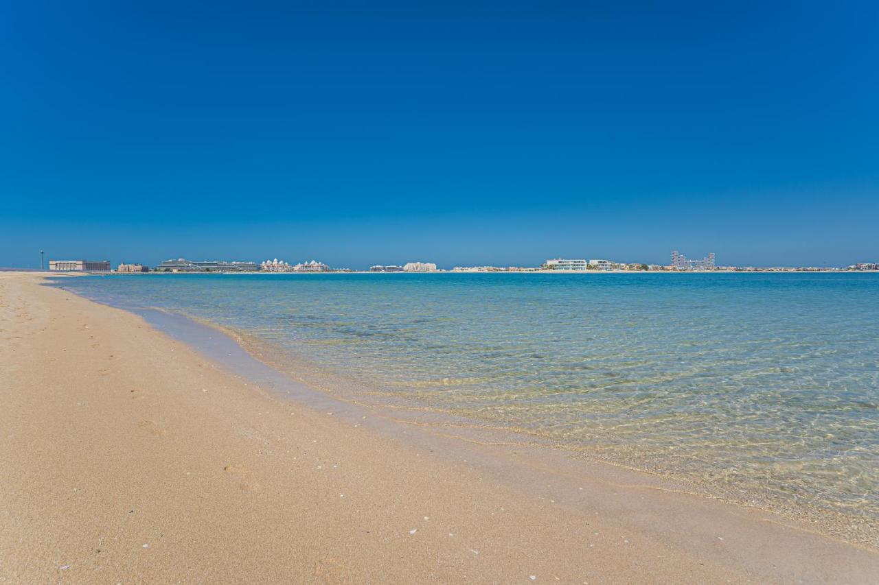 Higuests - Luxurious 1Br In Palms With Private Beach Access Dubai Esterno foto